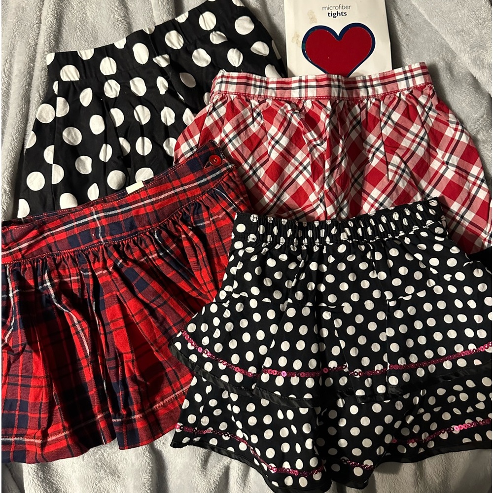 Four “4” little girls fluffy skirts